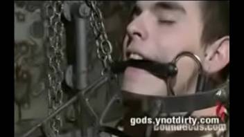 He fucks a pain slut in the electrified metal cage